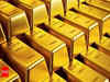 Gold marginally higher by Rs 34; silver declines by Rs 390