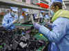 China's factory activity falls at slower pace on easing curbs - Caixin PMI