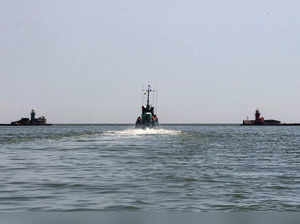 Russian Navy boat of the Black Sea Fleet patrols an aria of the Mariupol Sea Por...