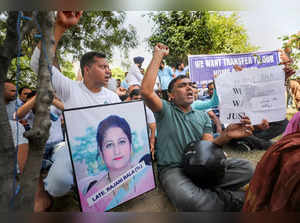 Jammu: Jammu-based government employees, posted in Kashmir, stage a protest demo...