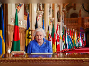 FILE PHOTO: Britain's Queen Elizabeth II signs her annual Commonwealth Day message at Windsor Castle, Britain