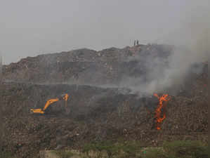 New Delhi: Flames and smoke billow from a fire at Bhalswa landfill, in New Delhi...