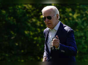 U.S. President Joe Biden and first lady Jill Biden return to the White House in Washington