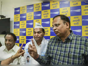 Delhi Health Minister and AAP leader Satyendar Jain with former vice-...
