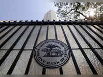 FILE PHOTO: The Reserve Bank of India (RBI) seal is pictured on a gate outside the RBI headquarters in Mumbai