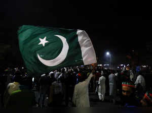 People attend a protest march by ousted Prime Minister Imran Khan in Islamabad
