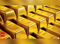 Gold slips as rise in US bond yields dent demand