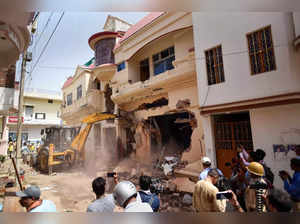 Prayagraj: A bulldozer being used to demolish the residence of Javed Ahmed, a lo...