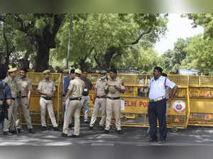 New Delhi: Police personnel stand guard near ED office, during summoning of Cong...