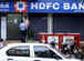 HDFC to sell four large stressed accounts before merger