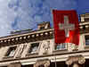 Shock Swiss rate hike sets markets on edge ahead of BOJ