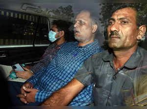 Delhi Health Minister Satyendar Jain being brought to ...