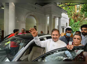 New Delhi: Former union minister Sharad Yadav and his wife Rekha Yadav leave as ...