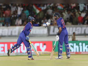 Rajkot, June 17 (ANI): India's Hardik Pandya and Dinesh Karthik during the 4th T...