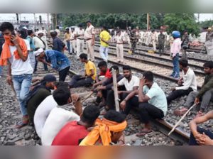 The protesters were removed from the spot around 11.15 AM and railway services and movement of vehicles resumed, a GRP official said.