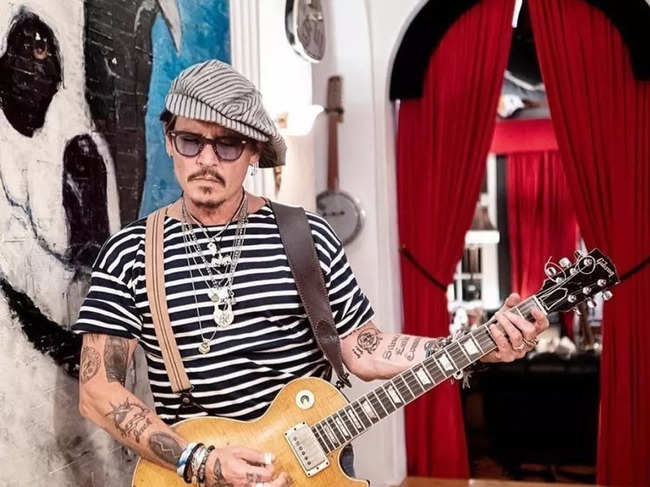 Johnny Depp's 13-track album will drop on July 15.​