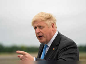 FILE PHOTO: British Prime Minister Boris Johnson arrives at RAF Brize Norton in Oxfordshire