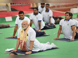 Mysuru:  Prime Minister Narendra Modi  performs yoga with yoga enthusiast to cel...