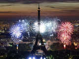 Fireworks burst over the Eiffel Tower