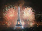 Fireworks illuminate the Eiffel Tower in Paris