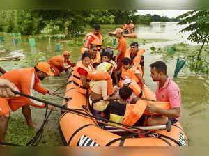 Kamrup: National Disaster Respond Force (NDRF) personnel rescue people from a fl...