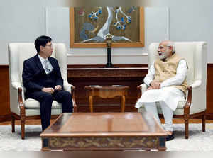 Prime Minister Narendra Modi meets Young Liu