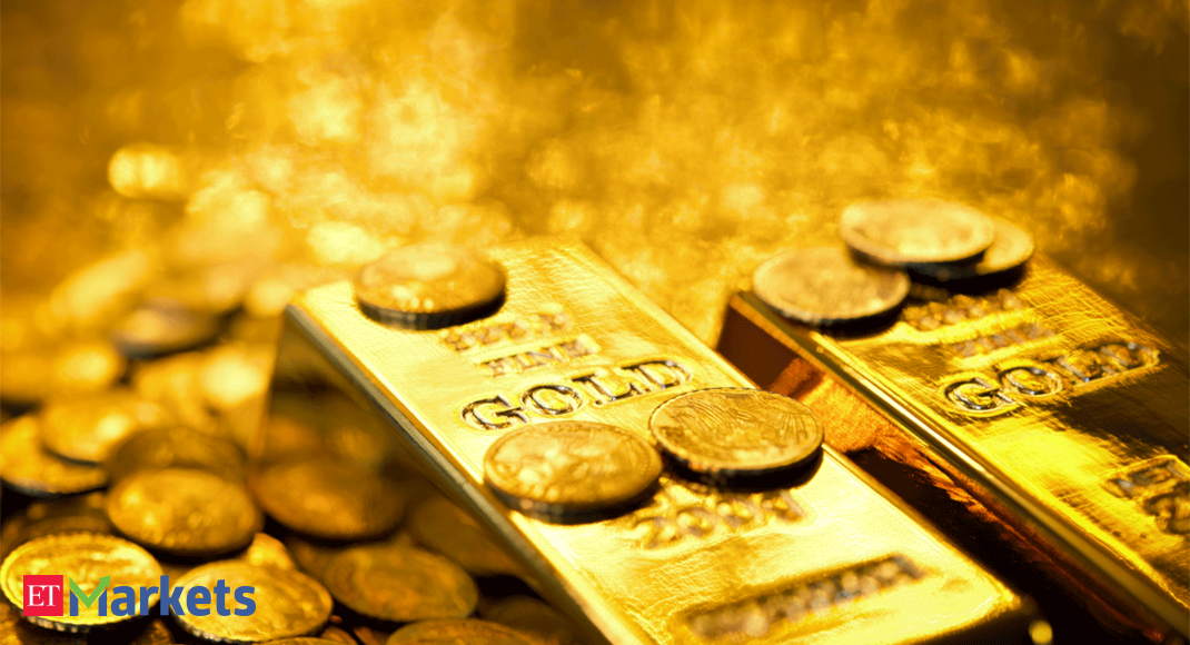 Gold flat, set for second weekly fall on bigger rate-hike fears