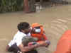 Silchar: Man braves flood waters to greet Assam CM Himanta Sarma with a ‘Gamusa’