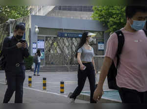 China slashes Covid quarantine