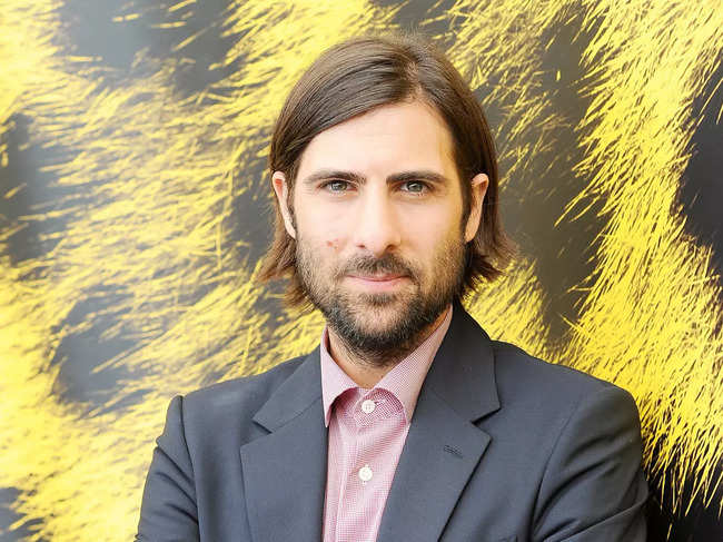 ​Jason Schwartzman will play Lucretius 'Lucky' Flickerman, the host of the competition and ancestor to Caesar Flickerman, who would become the voice of Panem.​