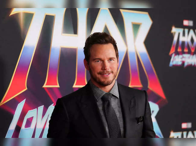Chris Pratt poses on the red carpet at the premiere of Marvel Studios 'Thor: Love and Thunder' at the El Capitan Theatre in Los Angeles.