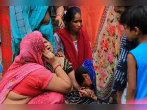 Udaipur: Family members mourn during the funeral procession of tailor Kanhaiya L...