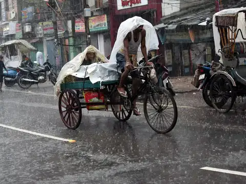​Vendor rides a tricycle