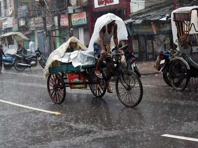 ​Vendor rides a tricycle