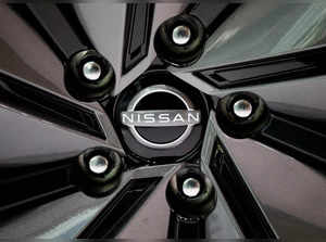 FILE PHOTO: The logo of Nissan Motor Corp is seen on a wheel of a car at a Nissan showroom in Tokyo