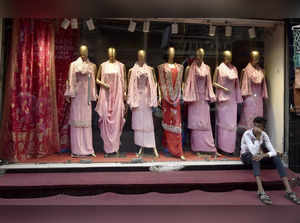 Kolkata: Mannequins wearing Indian traditional clothes displayed near the window...