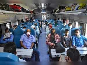 Mathura: Passengers sit inside the Jan Shatabdi Express train at Mathura Railway...