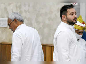 Patna: Bihar Chief Minister Nitish Kumar with RJD leader Tejashwi Yadav after an...