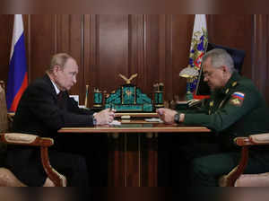 Russian President Vladimir Putin meets with Defence Minister Sergei Shoigu in Moscow