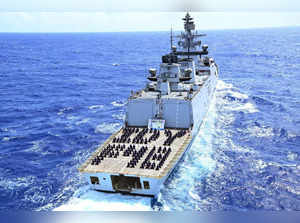 New Delhi, June 21 (ANI): Navy personnel perform Yoga onboard INS Satpura, opera...