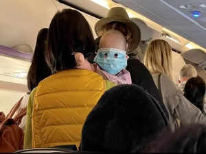 Viral Photo Shows Baby In Full Face Mask On New Zealand Flight