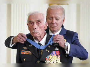 President Joe Biden awards the Medal of Honor to retired Maj John Duffy