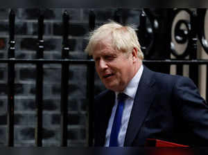 UK's Boris Johnson battles to hold on to PM post as top ministers quit