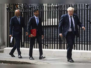 FILE - From left, British Health Secretary Sajid Javid, Chancellor of the Excheq...