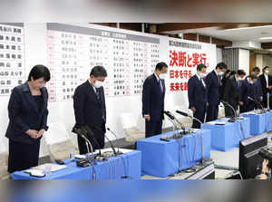 Japan's Prime Minister Kishida and party members offer a silent prayer for late former Prime Minister Shinzo Abe in Tokyo