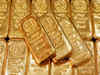 Gold ticks lower as lofty dollar dulls appeal