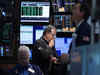 Wall Street ends lower ahead of economic data, earnings