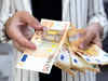 Euro teeters on brink of parity amid recession risks