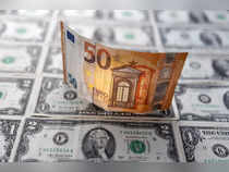 Euro strikes dollar