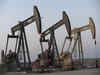 Oil prices slip on anticipated U.S. inventory build amid demand worries
